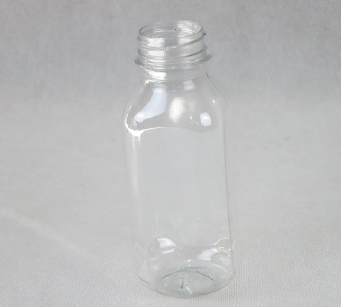 Butelki jednorazowe (cena brutto za 100 sztuk)  kwadratowe PET na soki 330 ml