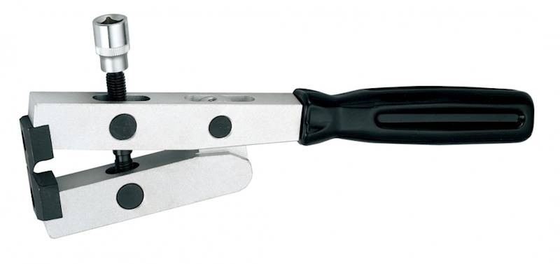 Przyrząd do zaciskania opasek przegubowych