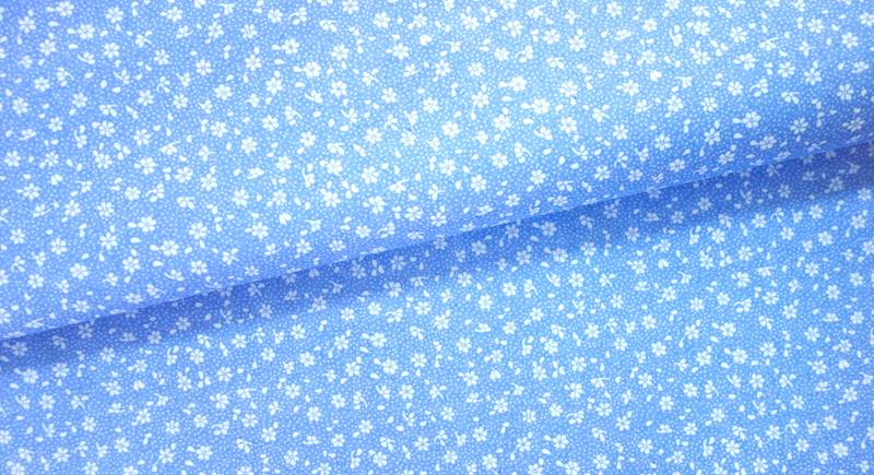 Kwiatuszki białe tło błękitne