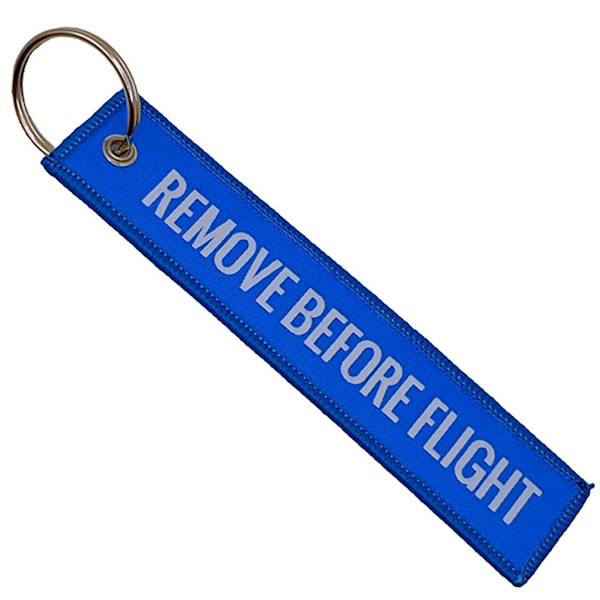 Brelok haftowany REMOVE BEFORE FLIGHT - niebieski