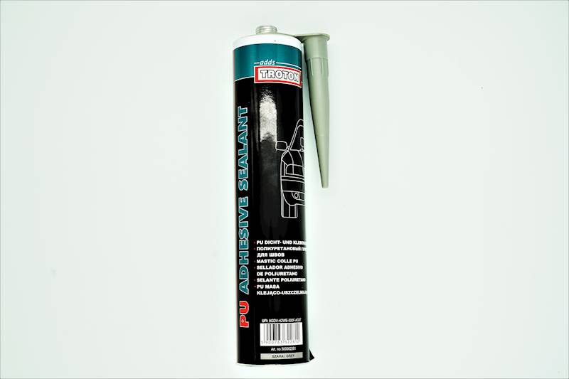 MASA USZCZEL/KLEJĄCA SZARA   310ml TROTON