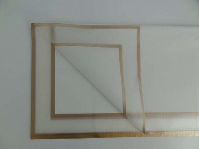 Folia florystyczna arkusze 58x58cm 20szt biała z transparentnym brzegiem HS10-1/58x58cm