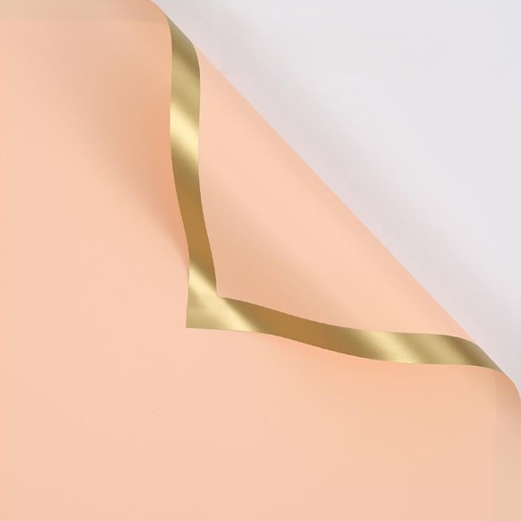 Folia florystyczna arkusze 58x58cm 20szt łososiowa SXY-05 ze złotym brzegiem