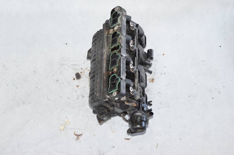 Kolektor ssący Opel Astra IV J Meriva B Corsa D E 1.4 16V A14XER 55563664