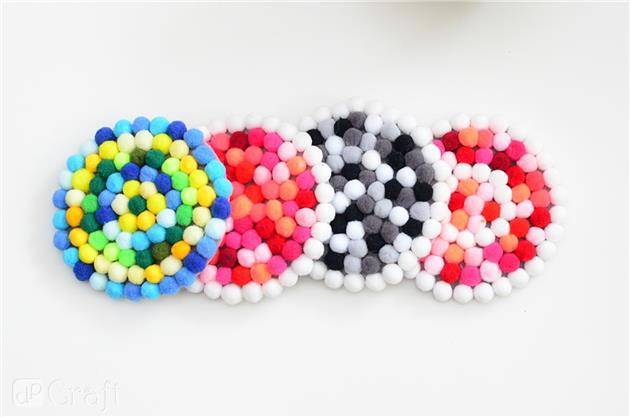 Pompony poliestrowe  1cm mix żółty 120szt