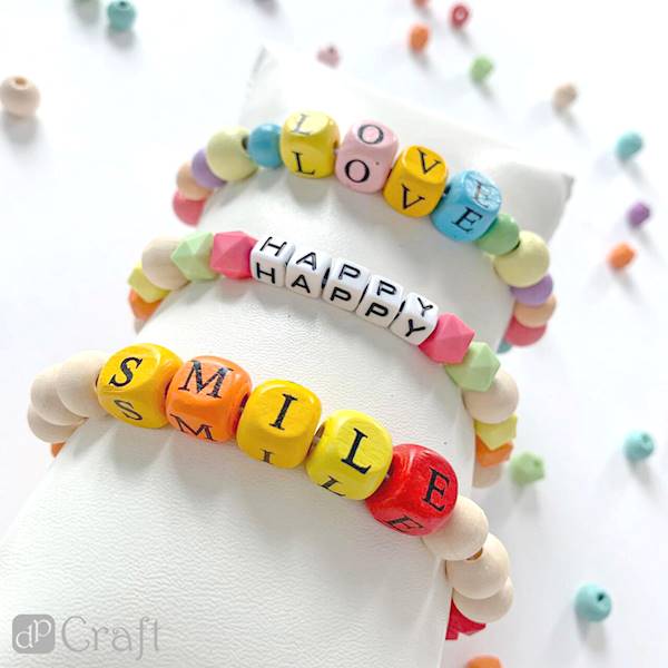 Drewniane koraliki litery 100szt