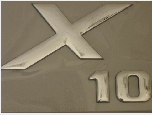 Naklejka "X10" wypukła chromowana  Zamiennik // Sticker "X10" Chrom Luxura X10 art. 16045(1)