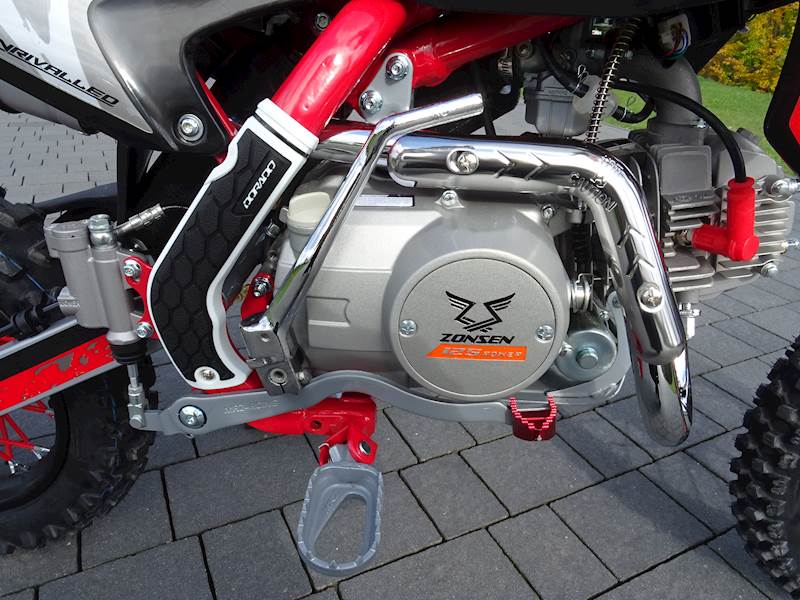 CROSS ASIX XB27 14/12 125 CC MAN E-START • Pojemność: 125cm3 • Kolor: Czarno/czerwony