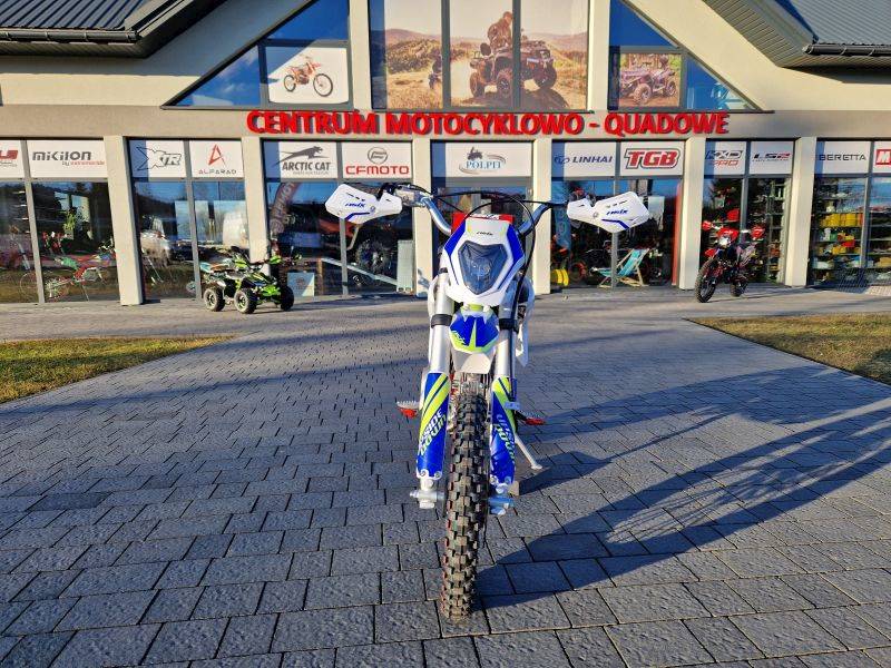 CROSS ASIX XB28 E-START 14/12 125CC • Kolor: Niebiesko/limonkowy