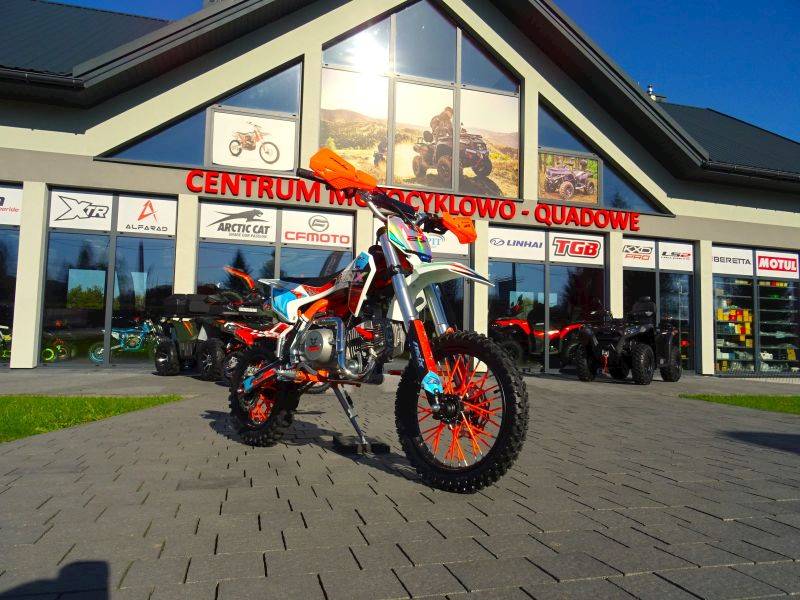 CROSS ASIX XB27 14/12 125 CC MAN E-START • Pojemność: 125cm3 • Kolor: Pomarańczowo/niebieski