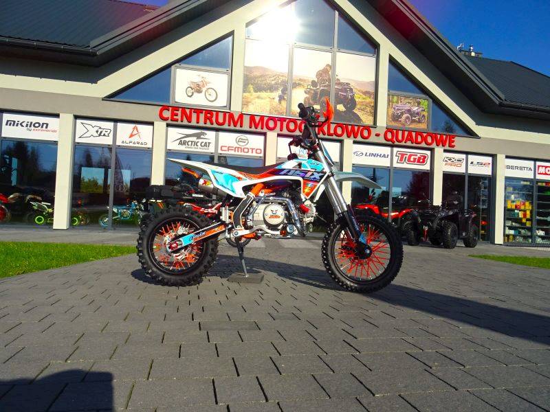CROSS ASIX XB27 14/12 125 CC MAN E-START • Pojemność: 125cm3 • Kolor: Pomarańczowo/niebieski