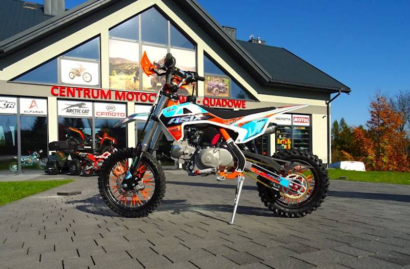 CROSS ASIX XB27 14/12 125 CC MAN E-START • Pojemność: 125cm3 • Kolor: Pomarańczowo/niebieski