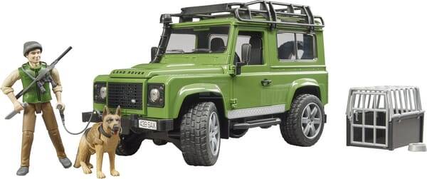 Land Rover Defender ze strażnikiem leśnym i psem