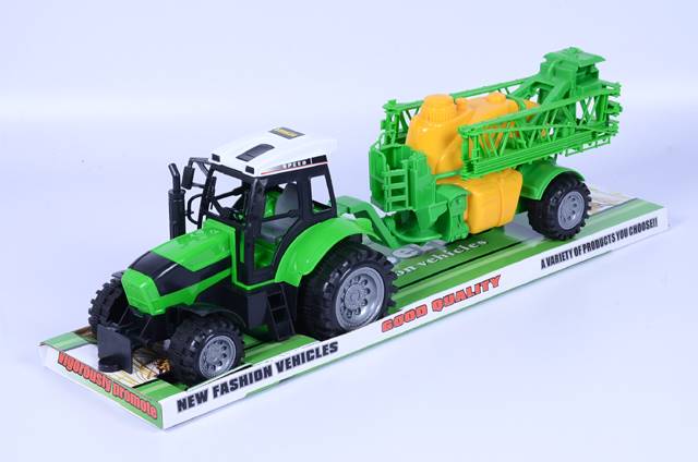 Traktor z maszyną roliczną